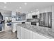 Modern kitchen with stainless steel appliances and granite counters at 250 Santa Maria St # 219, Venice, FL 34285