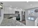 Modern kitchen with stainless steel appliances and granite countertops at 250 Santa Maria St # 219, Venice, FL 34285