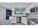 Updated kitchen featuring stainless steel appliances and granite counters at 250 Santa Maria St # 219, Venice, FL 34285