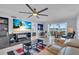 Bright living room with large TV and relaxing seating area at 250 Santa Maria St # 219, Venice, FL 34285