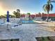 Relaxing pool area with comfortable seating and a clear, inviting pool, perfect for unwinding at 250 Santa Maria St # 219, Venice, FL 34285
