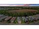 Aerial view of homes at sunset at 2539 Brassica Dr, North Port, FL 34289
