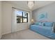 Charming bedroom with a daybed and lovely wall art at 2539 Brassica Dr, North Port, FL 34289