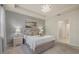 Spacious bedroom with a large bed and ensuite bathroom at 2539 Brassica Dr, North Port, FL 34289