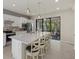 Modern kitchen with stainless steel appliances and a large island at 2539 Brassica Dr, North Port, FL 34289