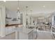 Open concept kitchen with large island and breakfast bar at 2539 Brassica Dr, North Port, FL 34289