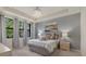 Bright and airy main bedroom with ample natural light and a tranquil atmosphere at 2539 Brassica Dr, North Port, FL 34289