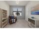 Home office with built in shelving and comfortable seating at 2539 Brassica Dr, North Port, FL 34289