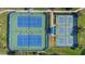 Aerial view of community tennis and pickleball courts at 2539 Brassica Dr, North Port, FL 34289