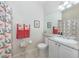 Bathroom with shower/tub combo, vanity, and coral-themed decor at 2907 Ravinia Cir # 2907, Venice, FL 34292