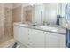 Bathroom features double vanity and a large shower at 2907 Ravinia Cir # 2907, Venice, FL 34292