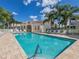 Inviting community pool with plenty of lounge chairs at 2907 Ravinia Cir # 2907, Venice, FL 34292