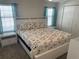 Comfortable main bedroom with king-size bed and nightstands at 334 Blackburn Blvd, North Port, FL 34287