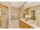 Elegant bathroom with double vanity and soaking tub at 4245 Whispering Oaks Dr, North Port, FL 34287