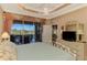 Spacious bedroom with backyard view and patio access at 4245 Whispering Oaks Dr, North Port, FL 34287