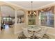 Casual breakfast nook with view into the living room and kitchen at 4245 Whispering Oaks Dr, North Port, FL 34287