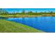 Peaceful water feature along the golf course at 4245 Whispering Oaks Dr, North Port, FL 34287