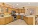 Fully equipped kitchen with ample counter and cabinet space at 4245 Whispering Oaks Dr, North Port, FL 34287