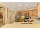 Large kitchen with ample counter space and stainless steel appliances at 4245 Whispering Oaks Dr, North Port, FL 34287