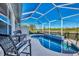 Private pool and spa with screened enclosure at 4245 Whispering Oaks Dr, North Port, FL 34287