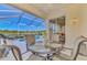 Relaxing screened lanai with pool view and outdoor seating at 4245 Whispering Oaks Dr, North Port, FL 34287
