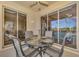 Enjoy outdoor dining in this screened lanai with glass sliders at 4245 Whispering Oaks Dr, North Port, FL 34287