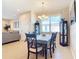 Bright dining room with table, chairs, and built-in hutch at 4334 Lenox Blvd, Venice, FL 34293