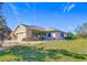 Single-story home with a two-car garage and well-manicured lawn at 4334 Lenox Blvd, Venice, FL 34293
