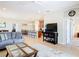 Open-concept living area with a view into the kitchen at 4334 Lenox Blvd, Venice, FL 34293