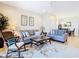 Spacious living room with comfortable seating and a dining area at 4334 Lenox Blvd, Venice, FL 34293