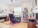 Home office with a desk, chair, and built-in shelving at 4334 Lenox Blvd, Venice, FL 34293