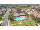 Community pool with surrounding landscape at 4334 Lenox Blvd, Venice, FL 34293