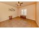 Bright bedroom featuring tile floors and a ceiling fan at 500 San Lino Cir # 521, Venice, FL 34292