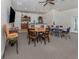 Community room with kitchen and tables at 500 San Lino Cir # 521, Venice, FL 34292