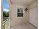 Private entryway with white door and shutters at 500 San Lino Cir # 521, Venice, FL 34292