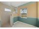 Shower and window in an brightly colored bathroom with tile floors at 52 Fairway Rd, Rotonda West, FL 33947