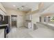 Kitchen with stainless steel appliances and white cabinets at 52 Fairway Rd, Rotonda West, FL 33947