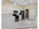 Modern kitchen featuring stainless steel appliances and ample counter space at 52 Fairway Rd, Rotonda West, FL 33947