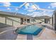 The property includes a sparkling pool and spacious outdoor living area at 52 Fairway Rd, Rotonda West, FL 33947