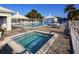 Inviting pool and spa area with lounge chairs and tables at 522 Clubside Cir # 10, Venice, FL 34293