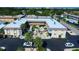 Aerial view of an apartment building with courtyard and parking at 537 Manatee Ct # 204, Venice, FL 34285