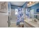 Bathroom with shower/tub, sink, and starfish decor at 537 Manatee Ct # 204, Venice, FL 34285