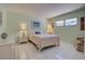 Bedroom with double bed and tiled floor at 537 Manatee Ct # 204, Venice, FL 34285