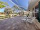 Large screened-in patio with water views at 752 Harrington Lake N Dr # 114, Venice, FL 34293