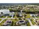 Wide aerial view of a neighborhood with canal access at 97 Robina St, Port Charlotte, FL 33954