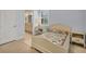 Charming bedroom with a vintage bedframe, and a unique quilt at 11897 Hunters Creek Rd, Venice, FL 34293