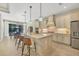 Bright open kitchen with large island and plenty of counter space at 11897 Hunters Creek Rd, Venice, FL 34293
