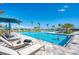 Inviting community pool with ample lounge chairs at 13307 Pacchio St, Venice, FL 34293