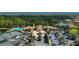 Community clubhouse with pool, tennis, and parking at 134 Savona Way, North Venice, FL 34275