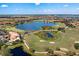 Aerial view of community with golf course and lake at 134 Savona Way, North Venice, FL 34275
